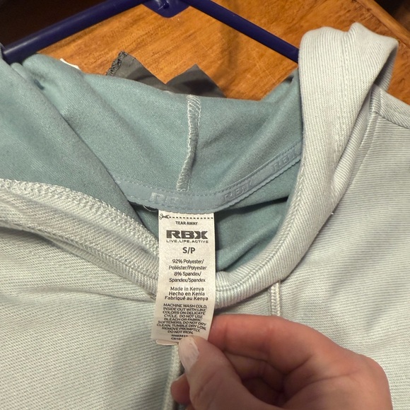 Women’s light blue hoodie.  Never worn. Has pockets in front. - Picture 4 of 4